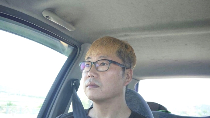 선감도로 향하는 차 안에서, 오광석 씨.