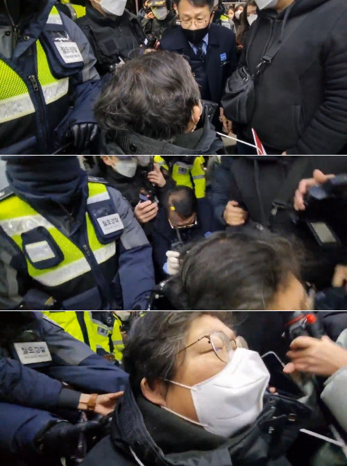 첫 번째 사진에서 이형숙 회장을 노려보는 사람이 권영창 용산역 역무팀장. 권 팀장은 철도경찰들과 함께 이형숙 회장의 휠체어를 강압적으로 밀었다. 사진 전국장애인야학협의회